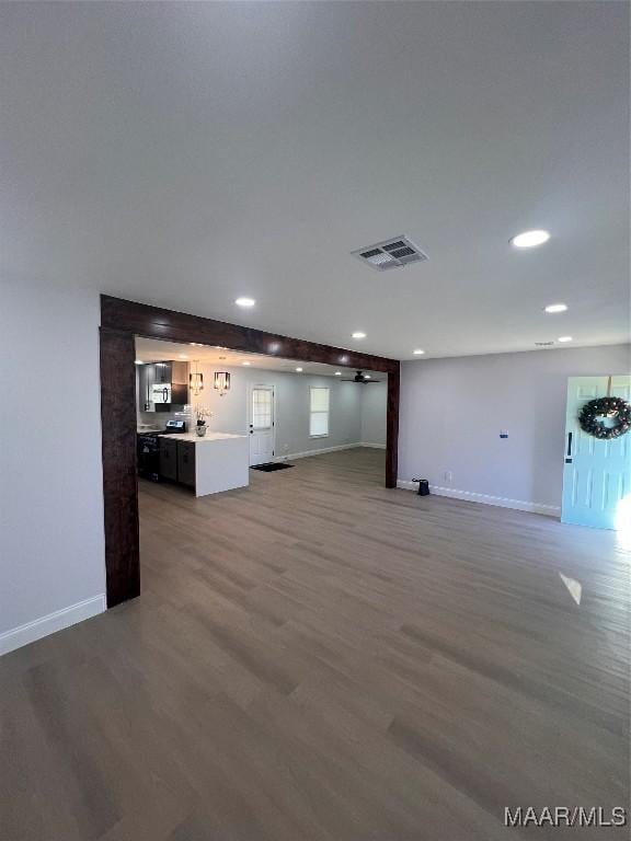 unfurnished living room with hardwood / wood-style floors