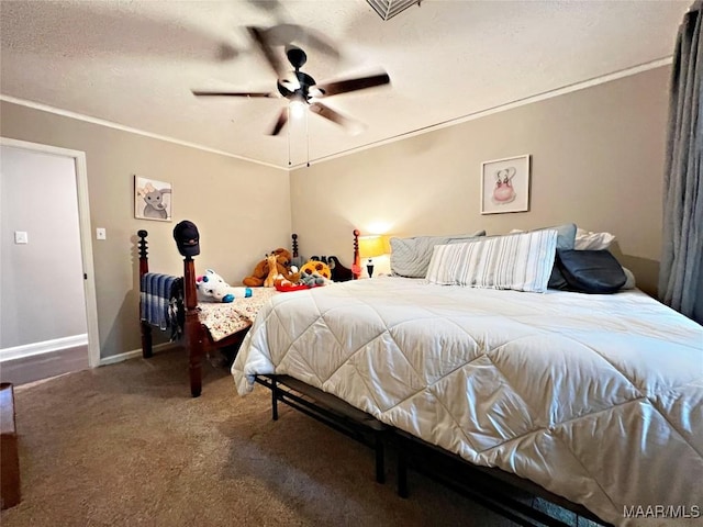 carpeted bedroom with ceiling fan and crown molding