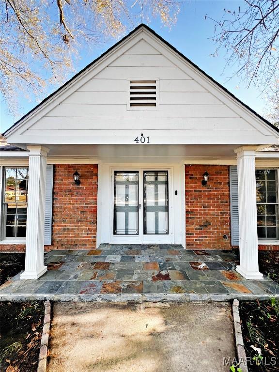 property entrance featuring french doors