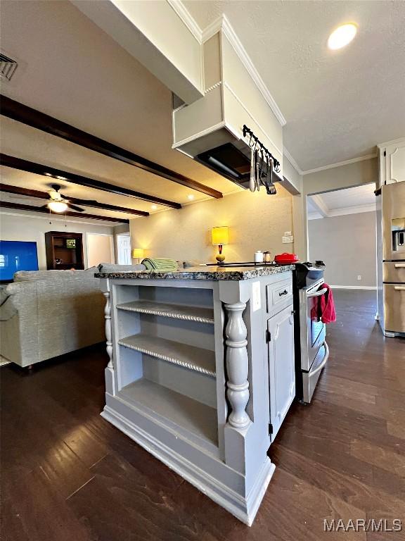 kitchen featuring white cabinets, dark hardwood / wood-style floors, stainless steel fridge, light stone countertops, and ornamental molding