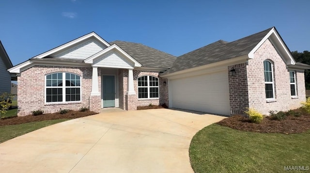 craftsman house with a garage