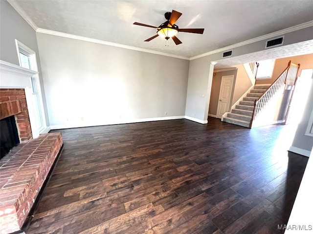 unfurnished living room with ceiling fan, crown molding, and a fireplace