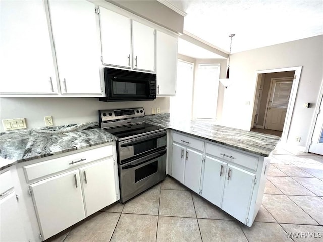 kitchen featuring white cabinetry, light tile patterned floors, double oven range, and decorative light fixtures