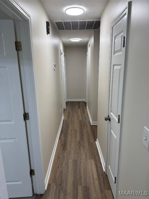 hall featuring dark hardwood / wood-style flooring