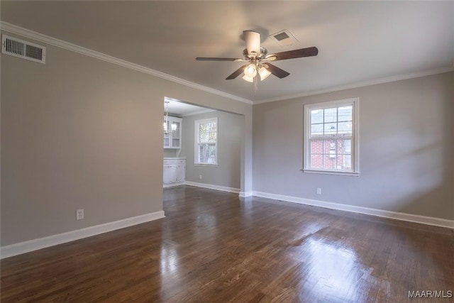 unfurnished room featuring dark hardwood / wood-style flooring, crown molding, plenty of natural light, and ceiling fan with notable chandelier