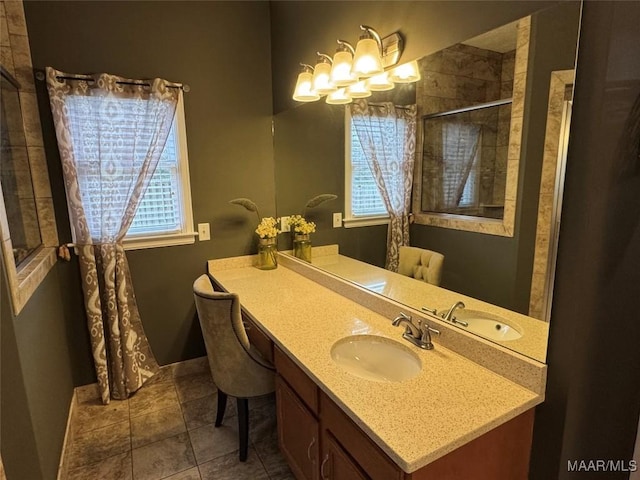 bathroom with vanity and an enclosed shower