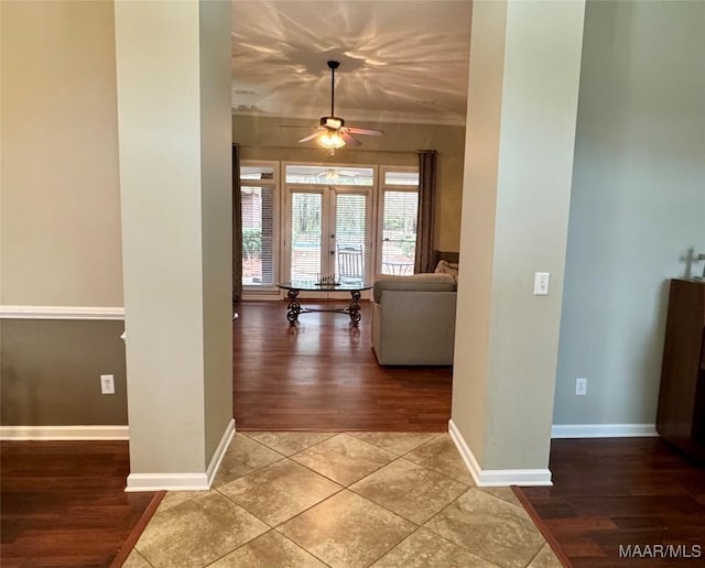 hall with tile patterned flooring and french doors