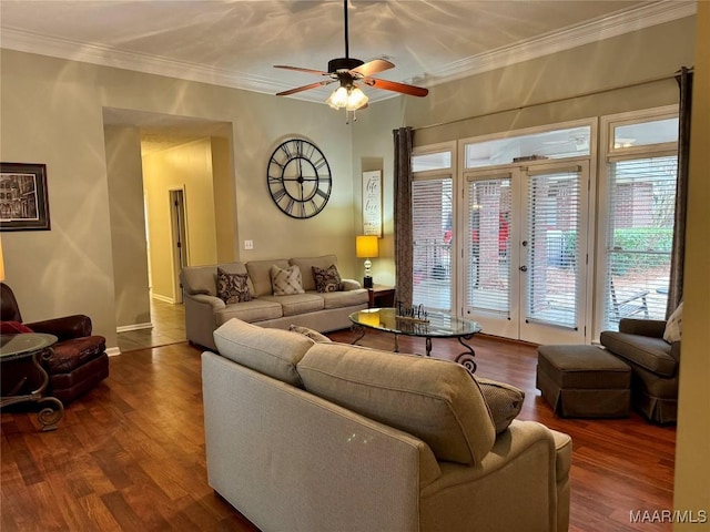 living room featuring hardwood / wood-style flooring, ceiling fan, a wealth of natural light, and french doors