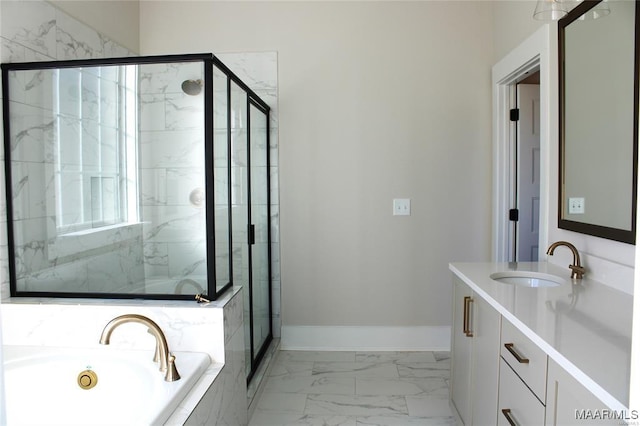 bathroom with vanity and separate shower and tub