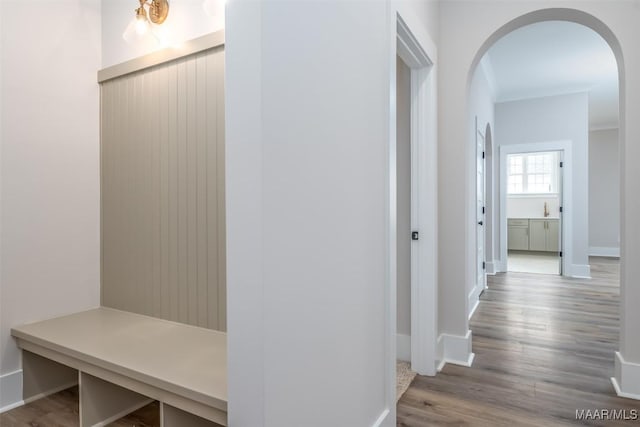 8325 Young Xing, Montgomery, AL 36116 - hallway featuring arched walkways and wood finished floors