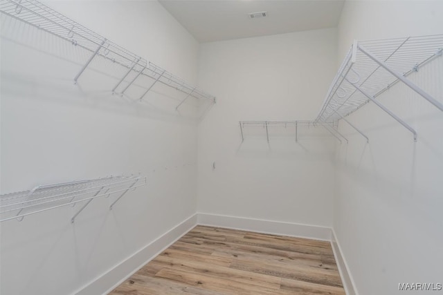 8325 Young Xing, Montgomery, AL 36116 - walk in closet featuring light wood-type flooring