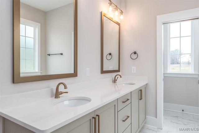 8325 Young Xing, Montgomery, AL 36116 - bathroom featuring double vanity, marble finish flooring, and plenty of natural light