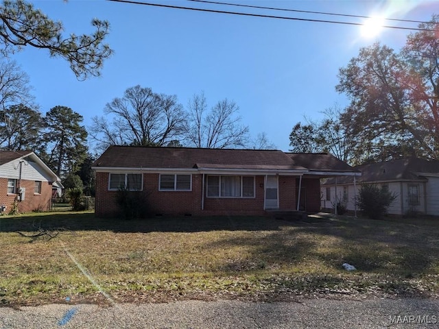 back of house with a yard