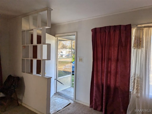 doorway featuring carpet flooring