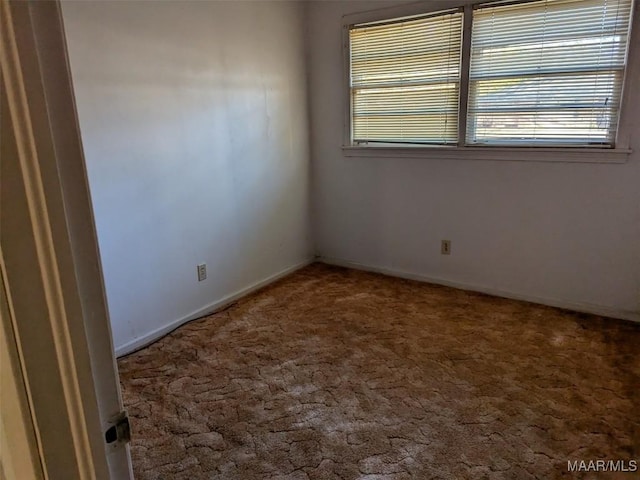 view of carpeted spare room