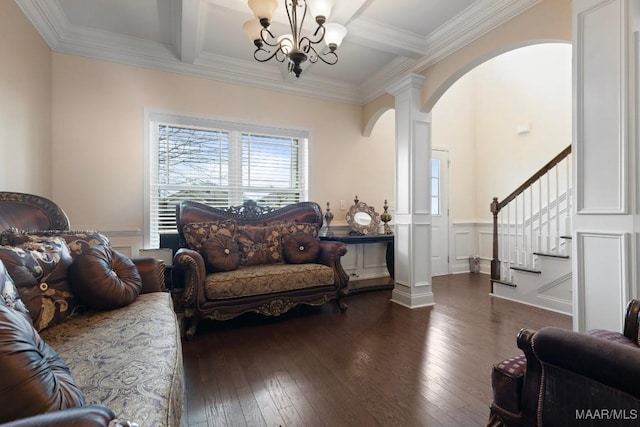 sitting room featuring beamed ceiling, dark wood-type flooring, coffered ceiling, and ornamental molding