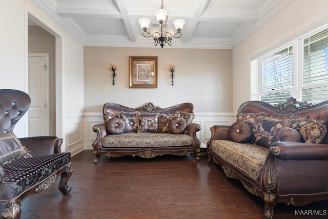 living room featuring beam ceiling, dark hardwood / wood-style flooring, coffered ceiling, and a notable chandelier