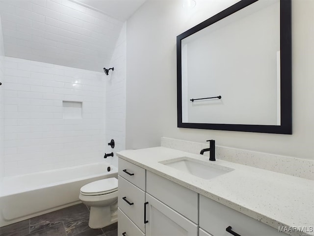 full bathroom featuring vanity, toilet, and tiled shower / bath combo