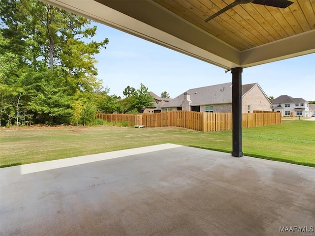 view of patio featuring ceiling fan