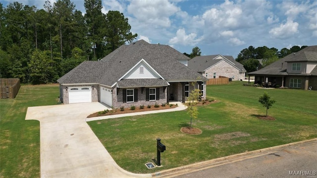 craftsman-style home with a garage and a front lawn