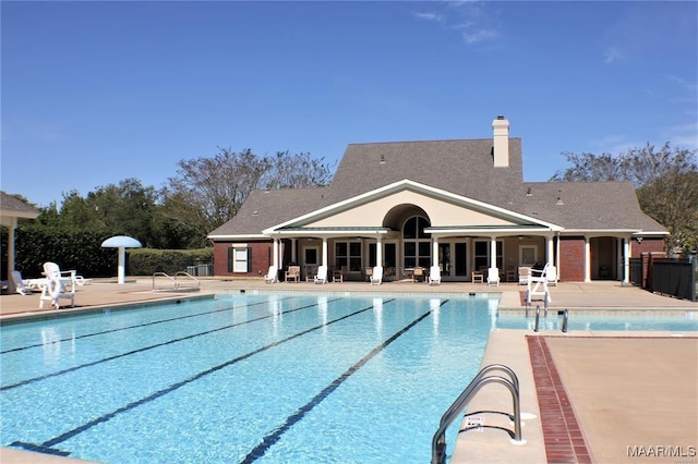 view of swimming pool featuring a patio