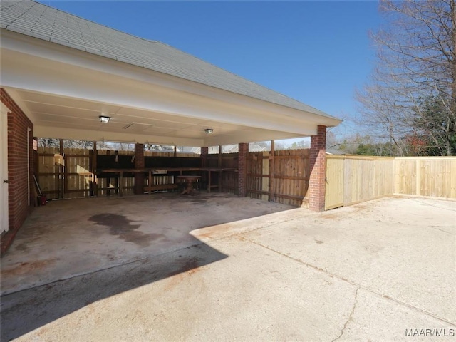 view of patio / terrace with a carport