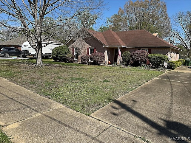 view of front of home with a front lawn