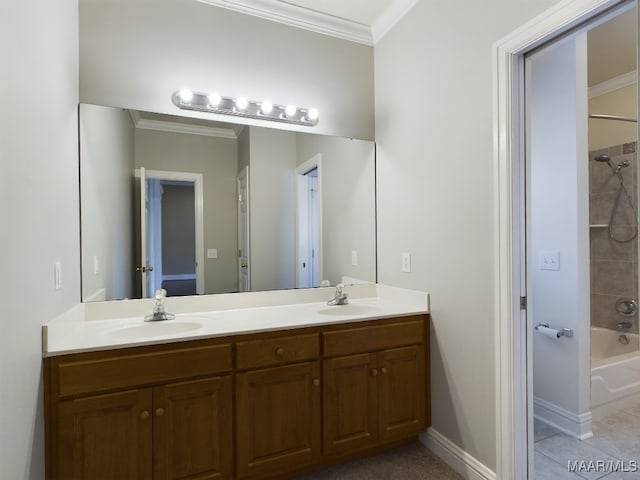 bathroom featuring tile patterned floors, vanity, ornamental molding, and washtub / shower combination