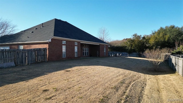 view of home's exterior featuring a yard