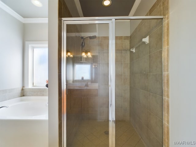 bathroom featuring separate shower and tub and crown molding