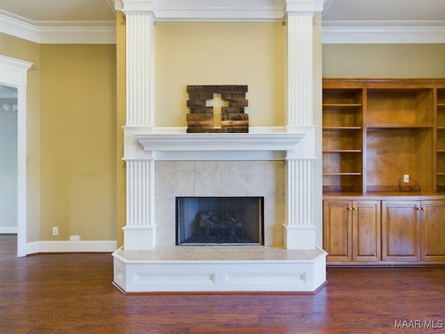 unfurnished living room featuring crown molding, a fireplace, and dark wood-type flooring