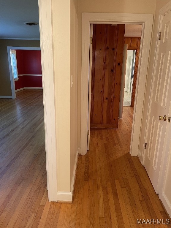 corridor featuring light hardwood / wood-style floors