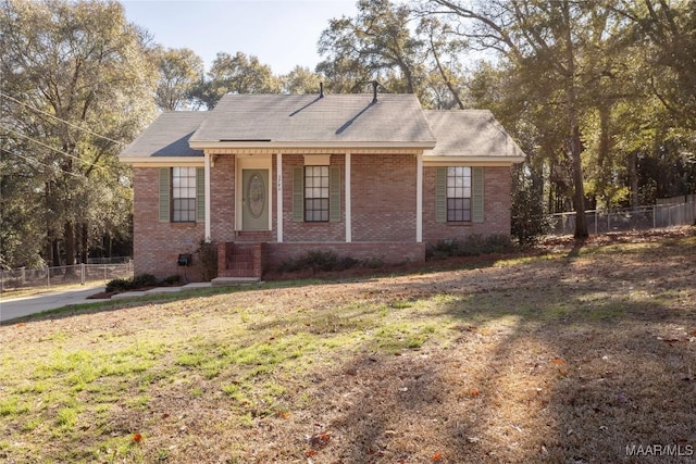 view of front of house with a front lawn and a porch