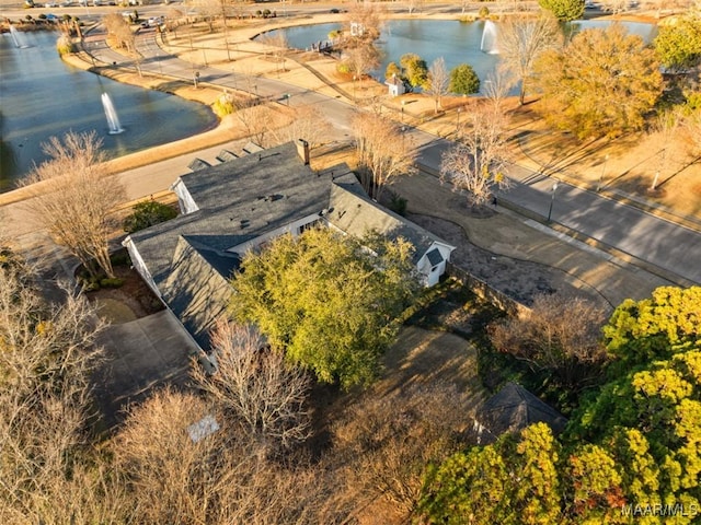 drone / aerial view with a water view