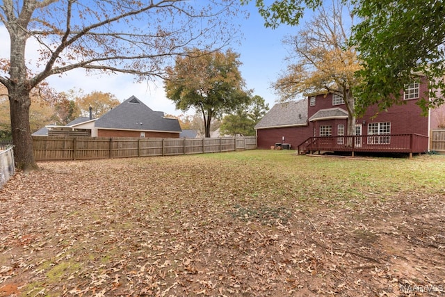 view of yard featuring a deck