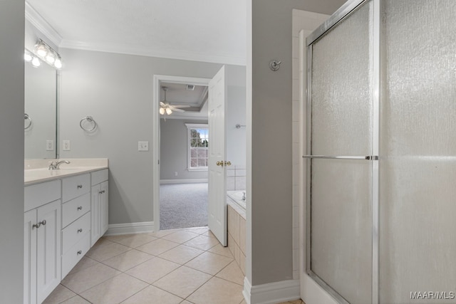 bathroom featuring ceiling fan, tile patterned flooring, separate shower and tub, crown molding, and vanity