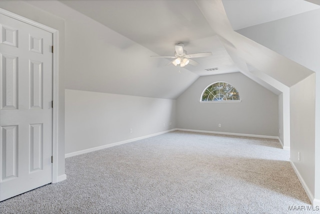 bonus room featuring carpet flooring, ceiling fan, and vaulted ceiling