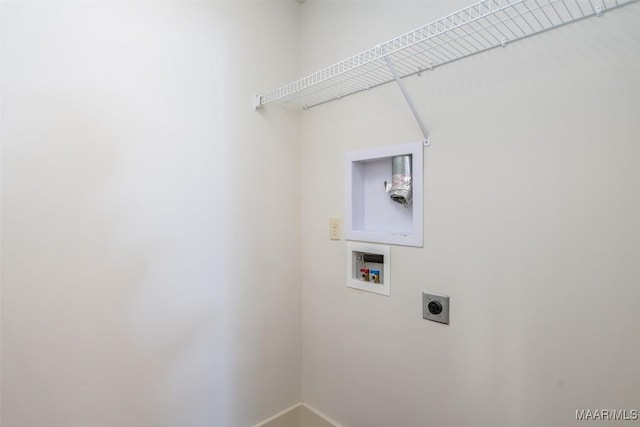 clothes washing area featuring hookup for an electric dryer and washer hookup