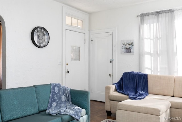 living room with parquet floors