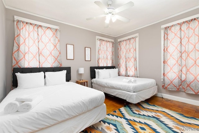 bedroom with ceiling fan, parquet flooring, and ornamental molding