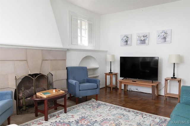 living room featuring dark parquet flooring