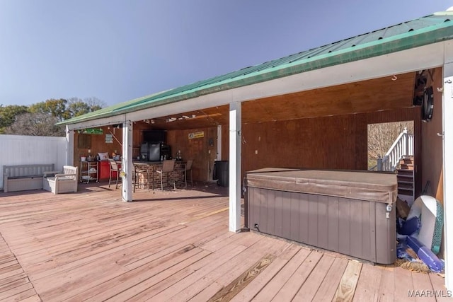 wooden deck with exterior bar