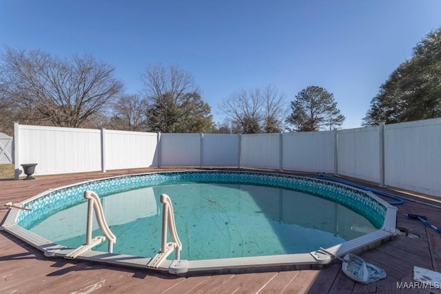 view of pool with a deck