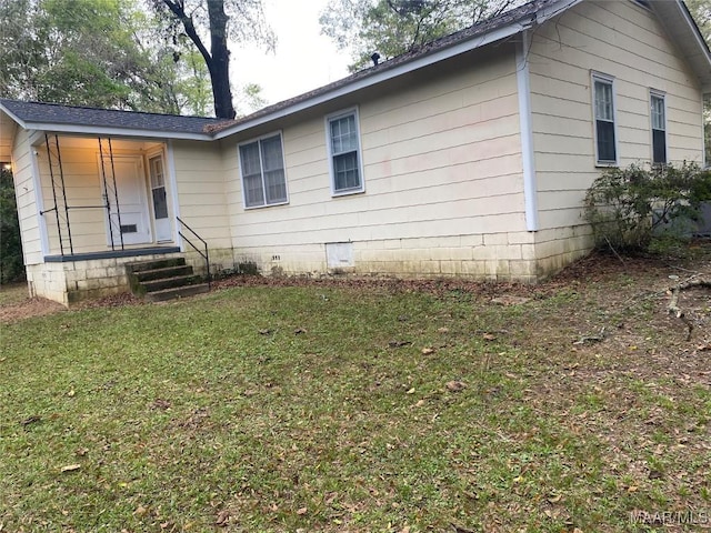 exterior space featuring a yard