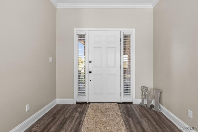 entrance foyer with dark hardwood / wood-style flooring and ornamental molding