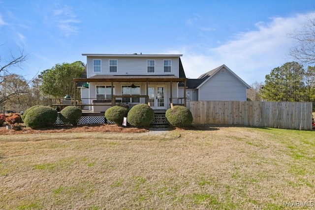 view of front of home with a porch and a front lawn