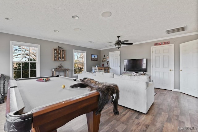 playroom with hardwood / wood-style flooring, ornamental molding, a textured ceiling, and billiards