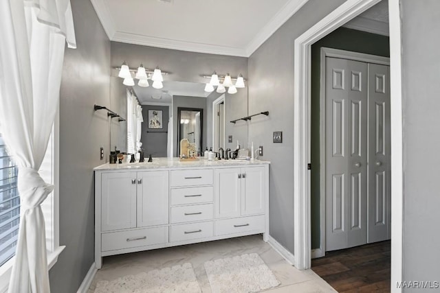 bathroom featuring crown molding, vanity, and hardwood / wood-style flooring