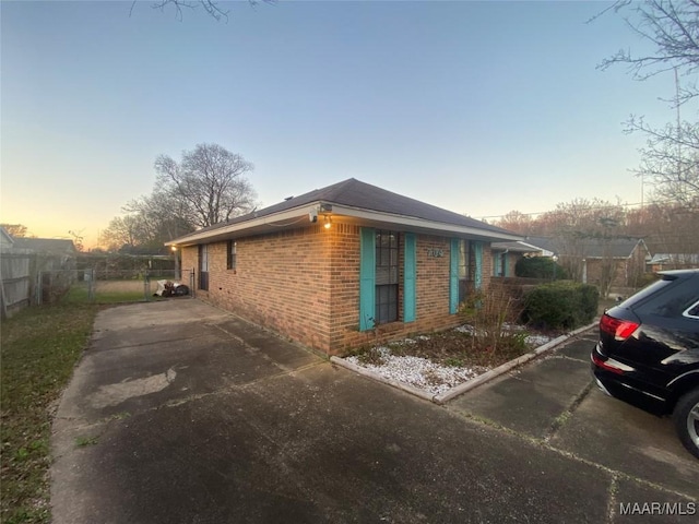 view of property exterior at dusk