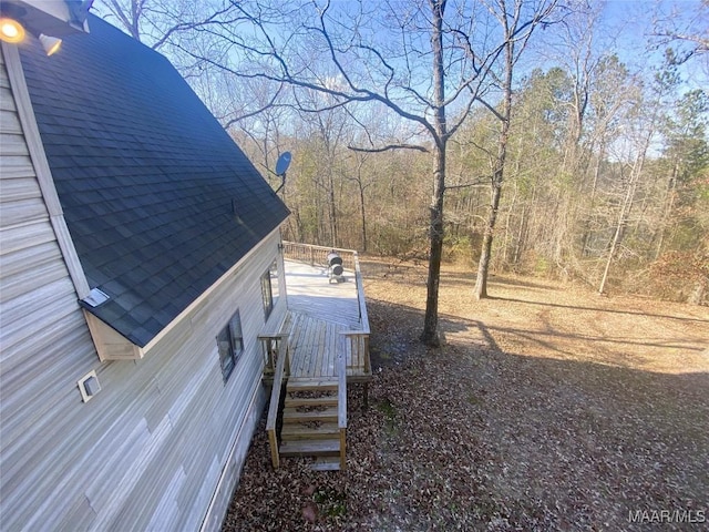 view of yard featuring a wooden deck